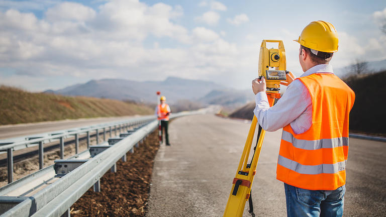 surveyors measuring