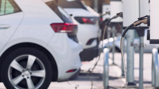 Electric vehicles at a charge station