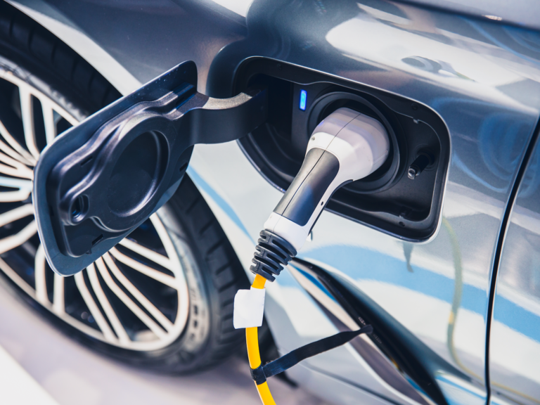 An electric vehicle connected to a chargepoint.